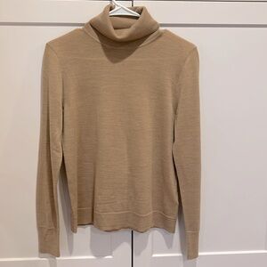 J Crew light weight 100% merino wool turtleneck sweater. Size small. Tan.